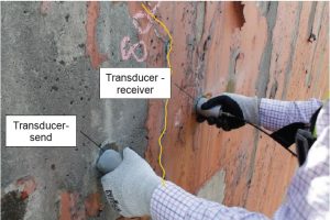 Ultrasonic Pulse Velocity for Evaluation of Concrete Cracks